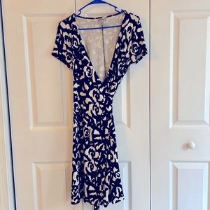 I never had the opportunity to wear this beautiful wrap dress.